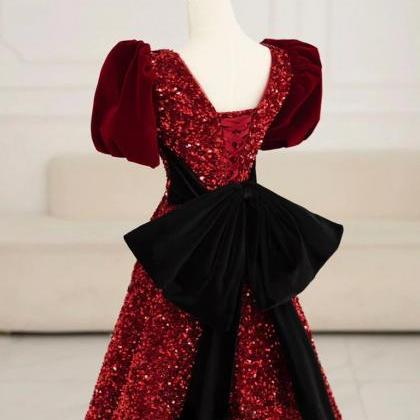 Ruby Red Sequin Gown With Velvet Accents And Puff..