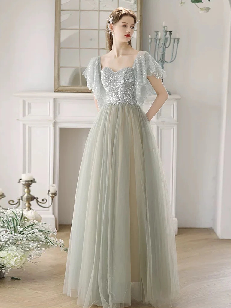 light green sequin prom dress Ava Presley 40112 Green Sequin Gown with Cutouts main image 1