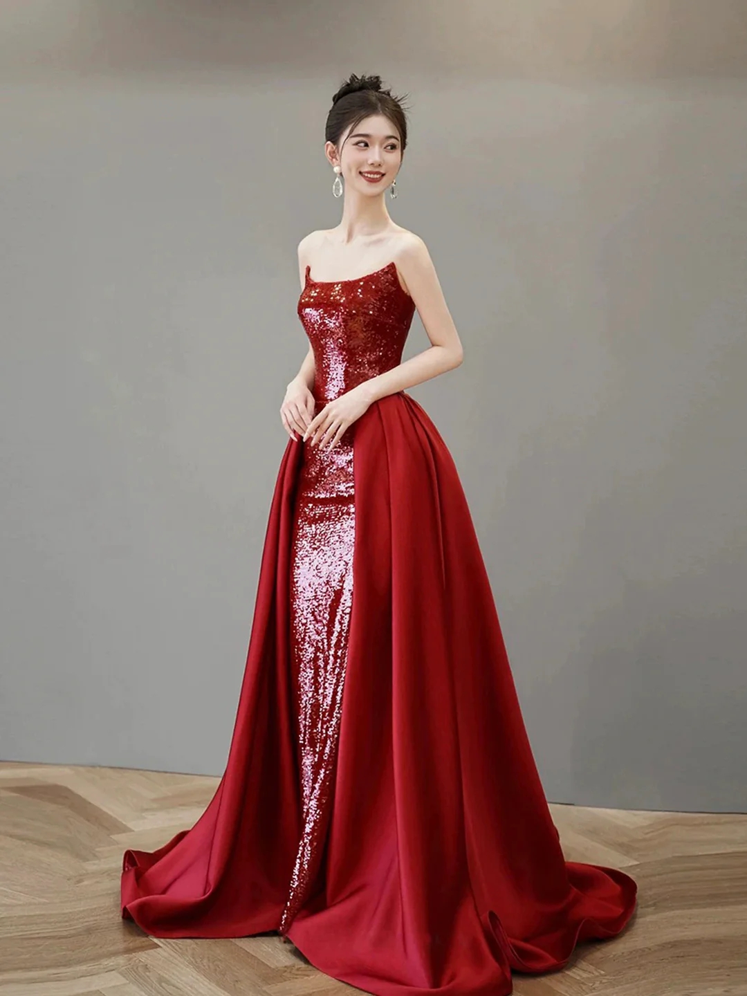 Red Sequin Strapless Gown With Dramatic Overskirt And Train Red Sequin Strapless Gown With Dramatic Overskirt And Train