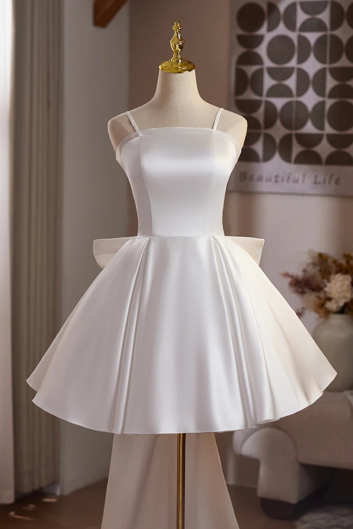 white satin fit and flare dress White Satin Party Dress With Fit And Flare Design And Bow Accent