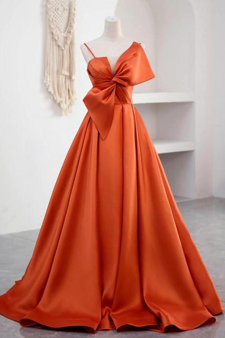 Elegant Orange Satin Gown With Sculptural Bow Detail