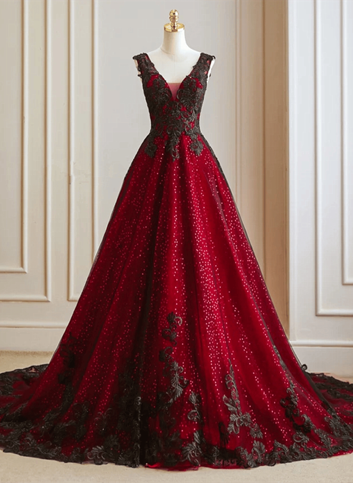Stunning Red Gown With Black Floral Detailing And Sparkling Accents on ...